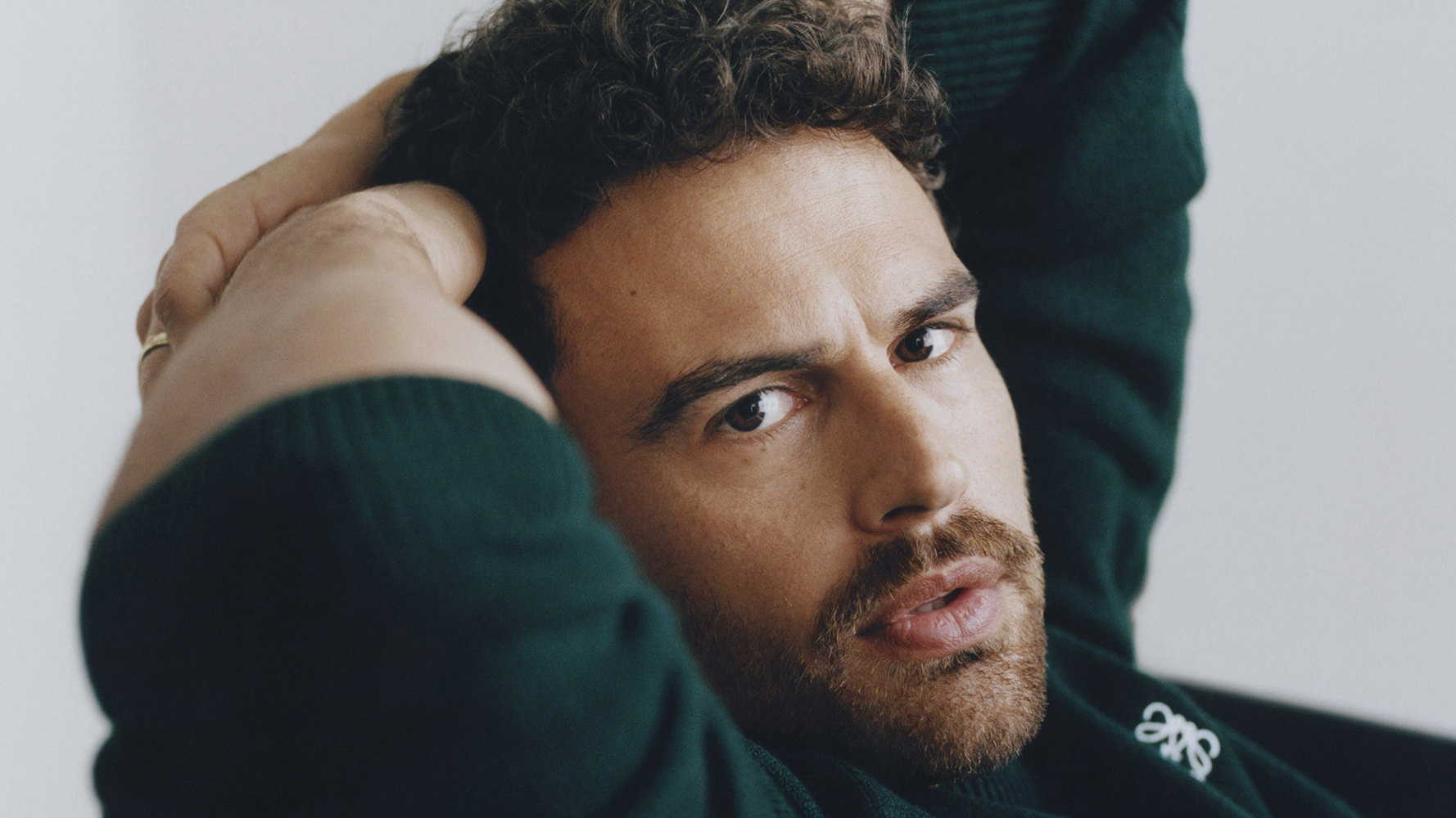 Theo James: Brooding Charm and Editor’s Obsession